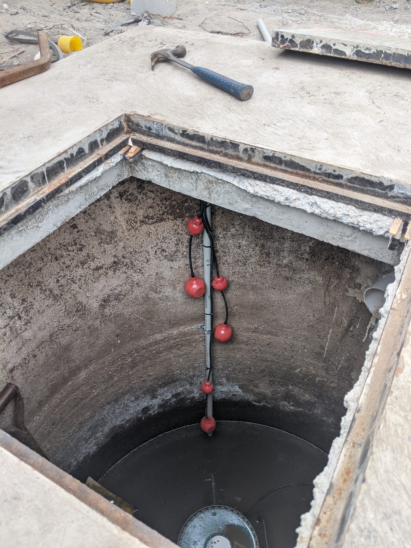 Float switches hung on the riser
